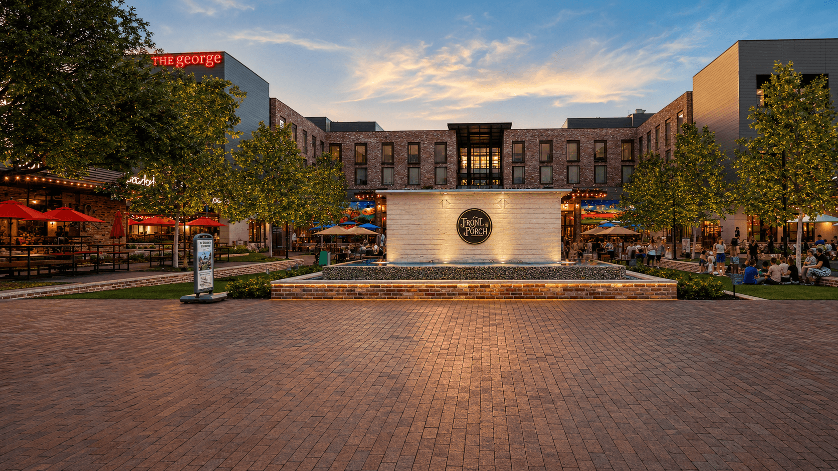 Century Square plaza at dusk — The George hotel, Front Porch fountain, outdoor dining